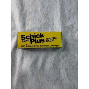 vintage Schick Super II Plus Pivoting Razor with 2 Super II Plus Twin Blade Cart